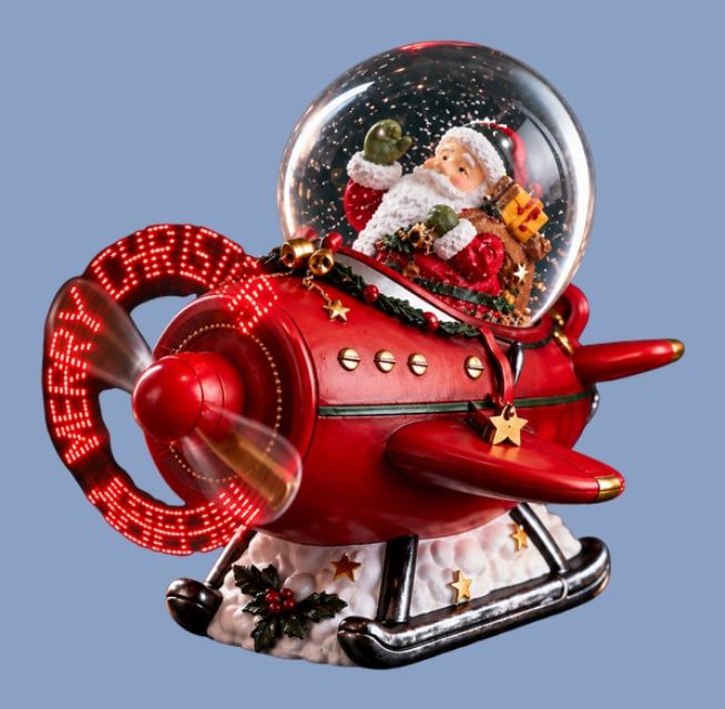 Glob de zăpadă muzical: avion roșu cu Moș Crăciun într-un glob și elice luminoasă cu inscripția Merry Christmas